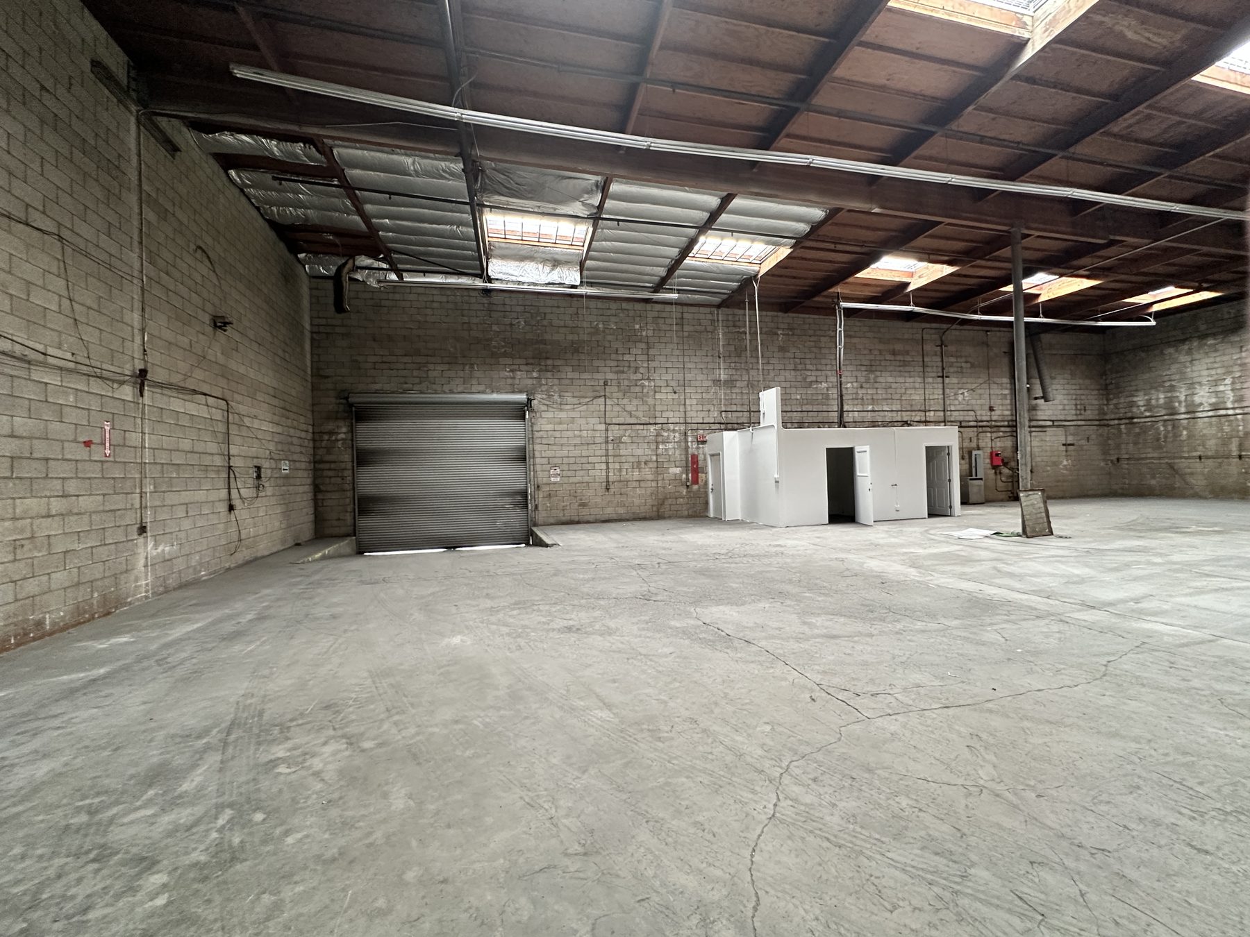 Warehouse interior with new painted office addition